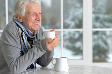 mature man drinking coffee