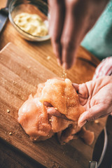 Woman Seasoning Meat