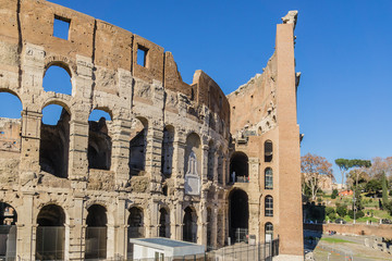 Fototapeta premium Iconic ancient Colosseum at sunset. Rome, Italy.
