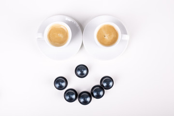 Obraz na płótnie Canvas smiley made from cups of coffee