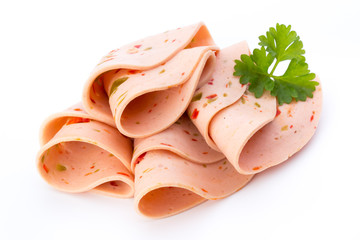 Sliced boiled ham sausage isolated on white background, top view