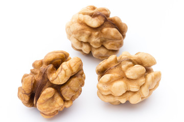 Fototapeta premium Walnut and walnut kernel isolated on the white background.