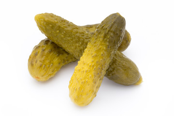 Marinated pickled cucumbers isolated on the white.