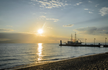 Fototapeta na wymiar Anchored boat on the waterfront