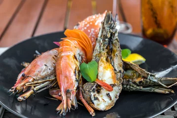Photo sur Plexiglas Crustacés délicieux plateau de fruits de mer grillés