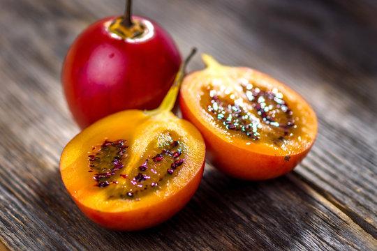Fresh fruit tamarillo on wooden background