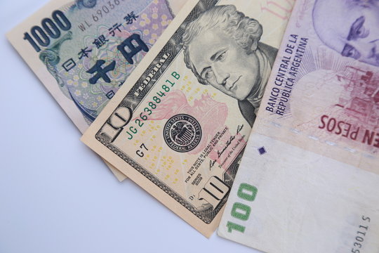 yen, dollar and argentine peso 