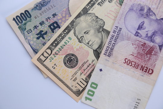 yen, dollar and argentine peso 