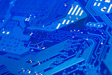 Closeup to Differential Pair on Blue Computer Printed Circuit Board [Soft Focus]
