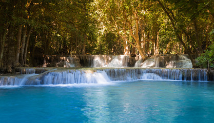 Natural deep forest blue stram waterfall, natural landscape background