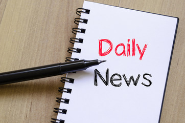 Daily news concept on notebook