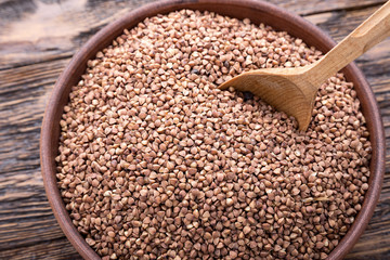plate with raw buckwheat