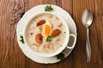 Traditional Polish white borsch with Easter decoration