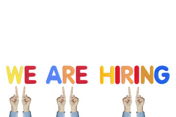 Hands point to wording 