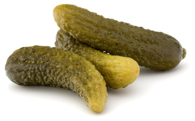 pickled or marinated  cucumbers isolated on white background cut