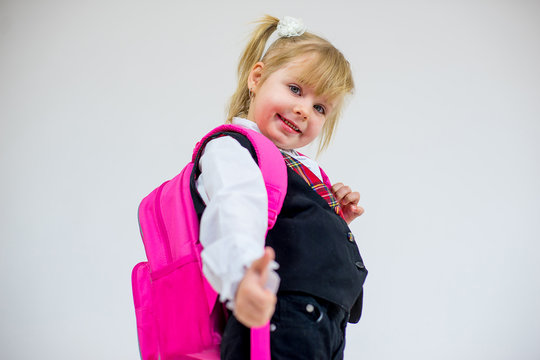 portrait of young schoolgirl with schoolbag