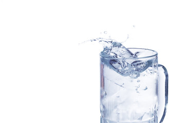 water splash in glass on white background.