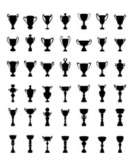 Black silhouettes of trophy cup on a black background