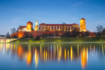 Fototapeta premium Wawel Castle in the evening in Krakow with reflection in the river, Poland. Long time exposure