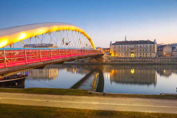 Naklejka premium Bernatka footbridge over Vistula river in Krakow, Poland