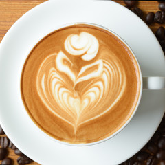 coffee latte art and  mocha on old wooden background square fram