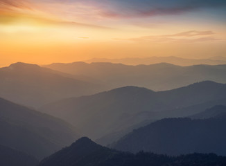 Obraz premium Mountain valley during sunrise. Natural landscape in the summer time