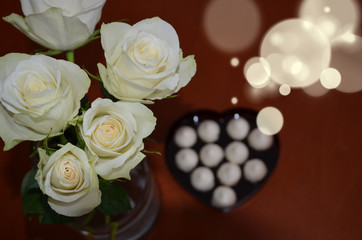 Obraz na płótnie Canvas pistachio roses on a white background, tenderness, love, valentines day