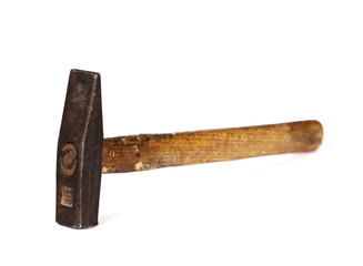 Old hammer isolated on white