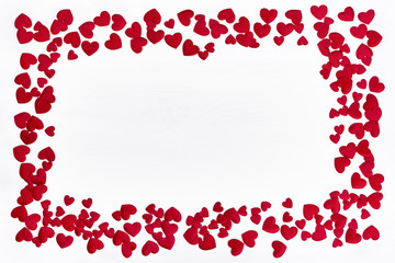 Valentines Day background with red hearts. Border, copy space