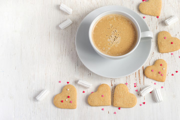 Cup of coffee and cookies for Valentine's Day