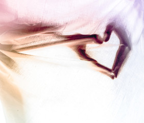 Hands making shape of heart