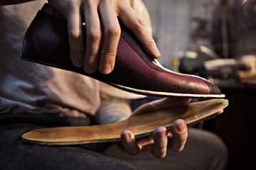 Shoemaker makes shoes for men. He sticks sole