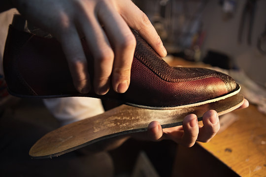 Shoemaker makes shoes for men. He sticks sole
