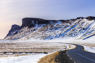 Mountain snow and road in Iceland.