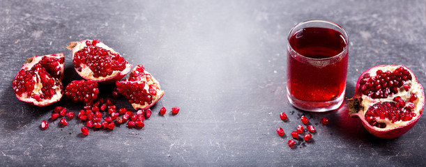 glass of pomegranate juice with fresh fruits