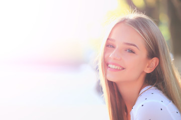 blonde cute girl on sunny day