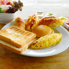 fried eggs, bacon, sausages,breakfast and fresh salad for health