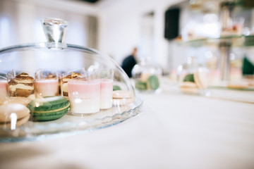 Wedding reception candy bar dessert table. Delicious sweet buffet with cupcakes. Sweet holiday...