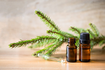 Spruce needle aromatherapy essential oils in bottles