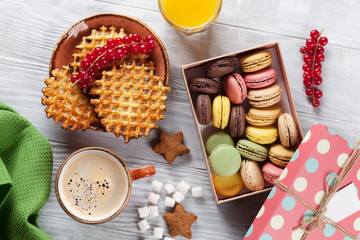 Coffee with waffles and sweets