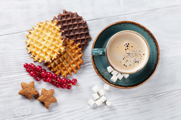 Coffee with waffles and sweets