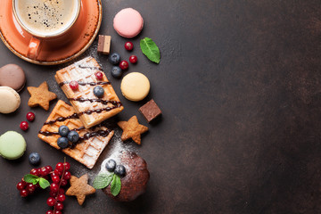 Coffee with waffles and sweets