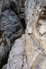 Difficult mountain trail with cable