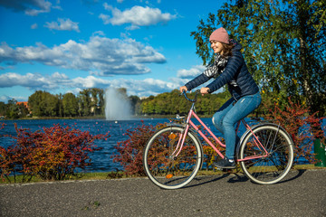 Girl biking in city 