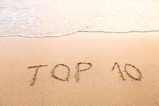 top 10, sign on the sand beach