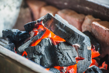 Burning charcoal grill