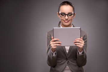 Young businesswoman working with tablet computer