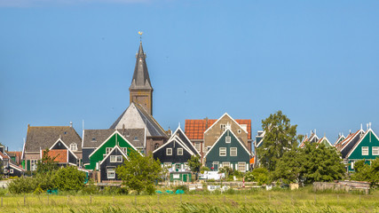 Traditional dutch Village with with colorful houses and church