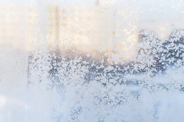 variety of frost patterns on a winter window