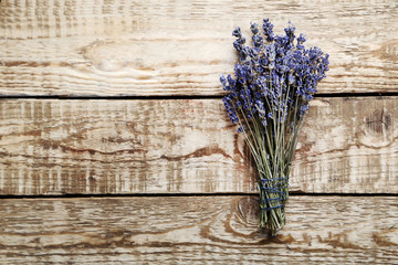 Bunch of lavender flowers on grey wooden background